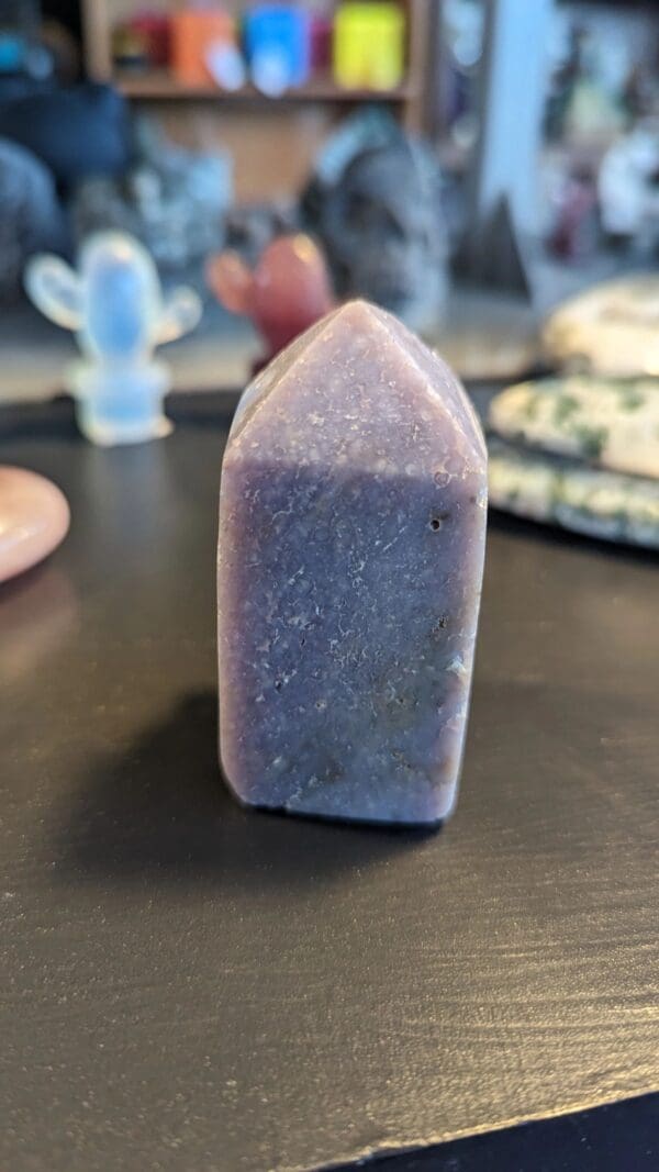 A purple soap sitting on top of a table.