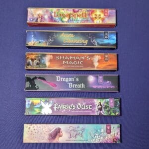 A purple table with six different colored bookmarks.