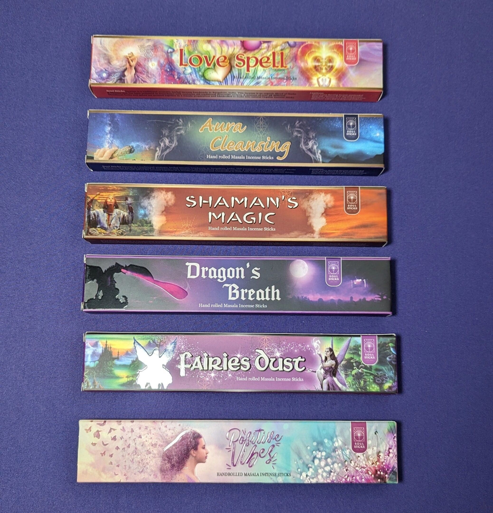 A purple table with six different colored bookmarks.