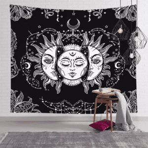 A black and white tapestry with sun and moon