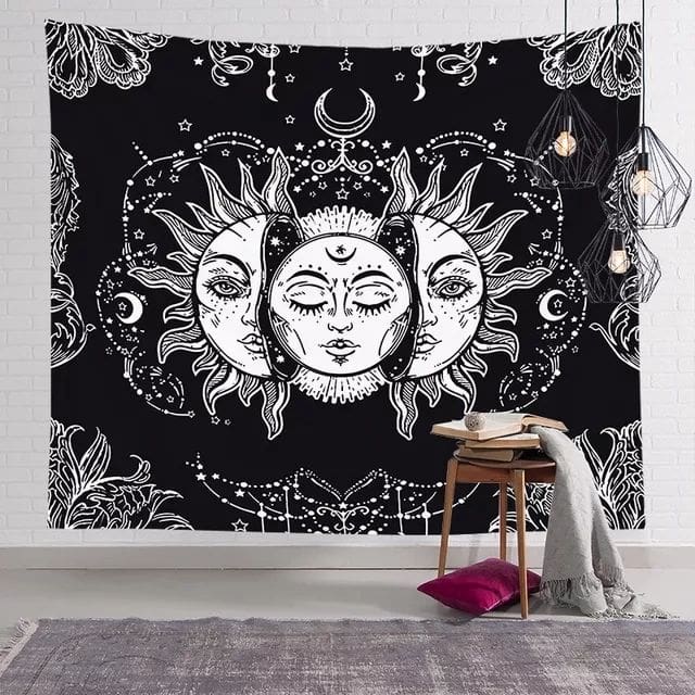 A black and white tapestry with sun and moon