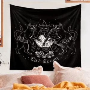 A black and white tapestry with cats on it.