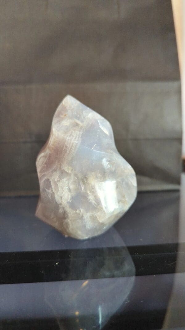 A large rock sitting on top of a table.