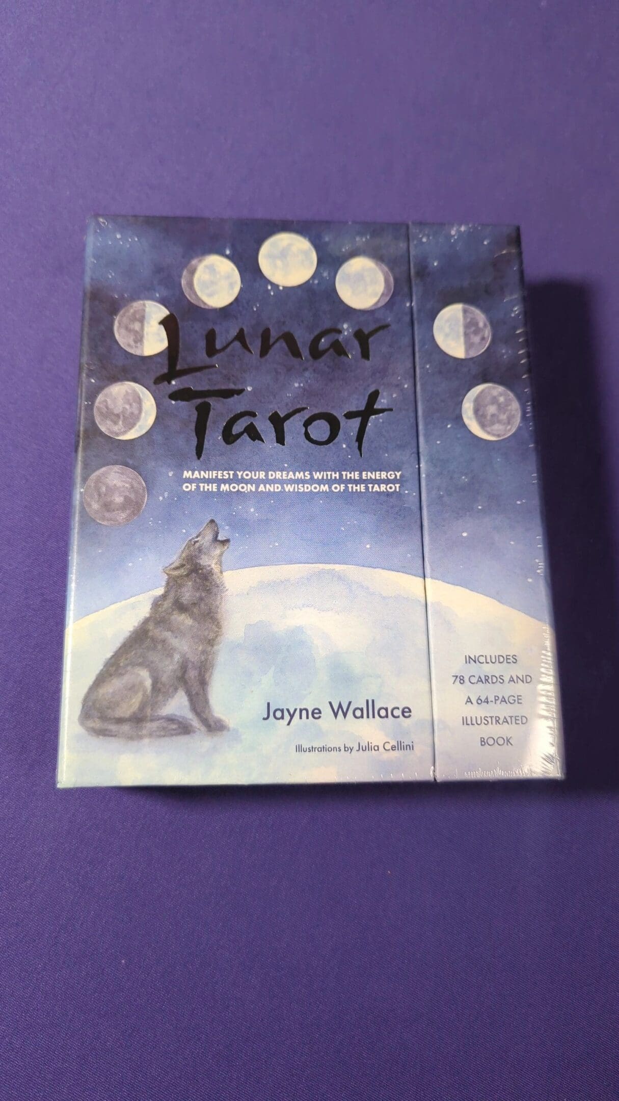 A book about tarot is sitting on the table.