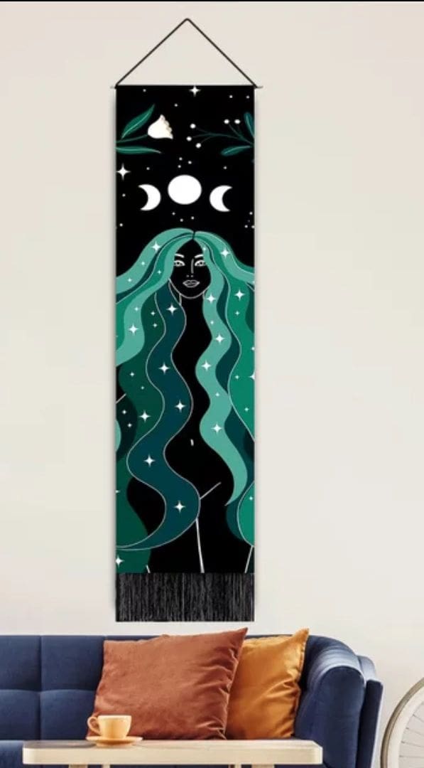 A painting of a woman with long hair and moons.