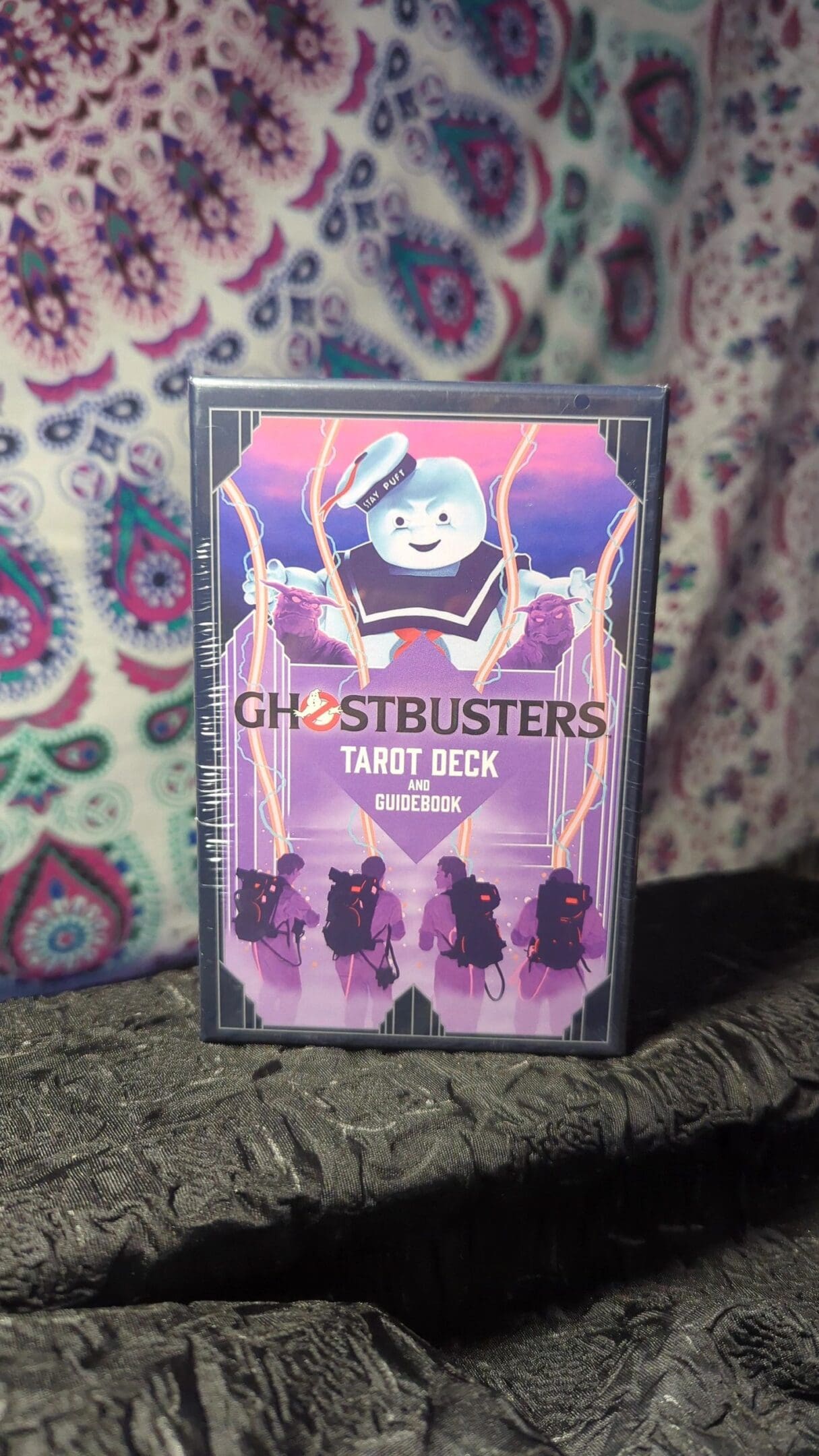 A box of tarot deck with the cover art for ghostbusters.