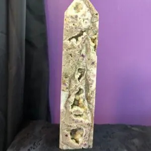 A piece of wood with some carvings on it