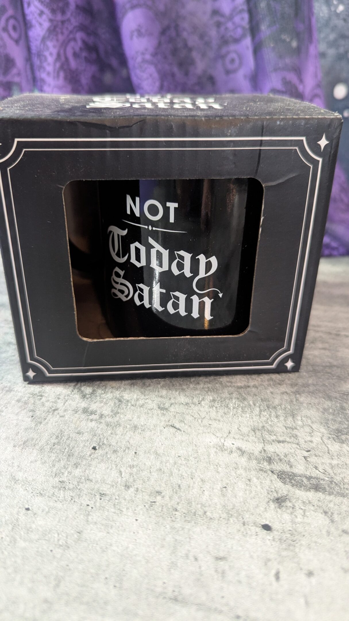 A black mug with the phrase "Not Today Satan" in white text.